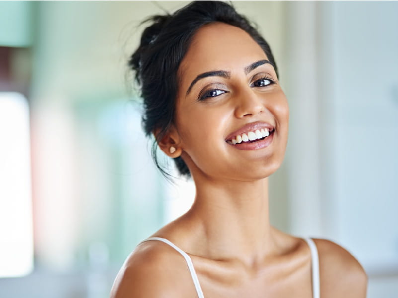 a young female smiling